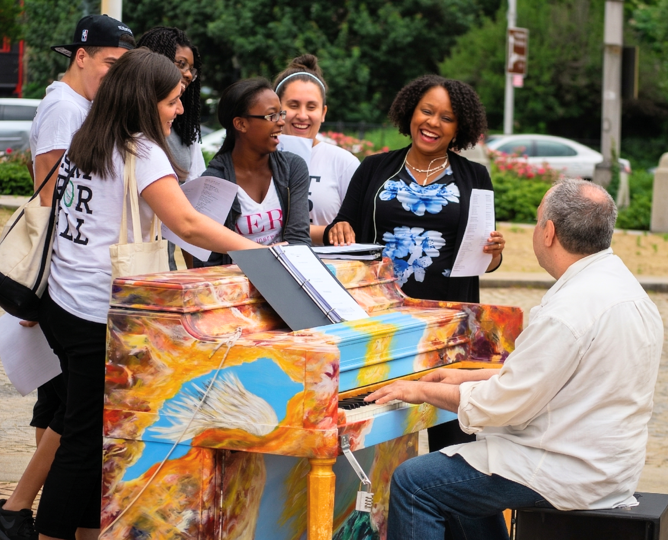 Group singing at a Sing for Hope Piano activation